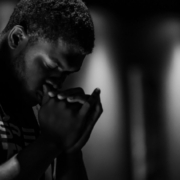 man praying;surrender to god